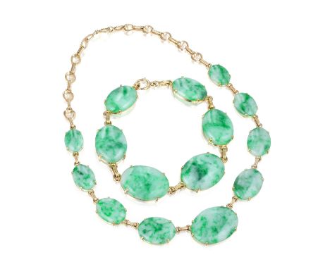 Crafted out of 14K yellow gold, featuring graduated size oval-shaped natural jade plaques; necklace length 16 inches, necklac