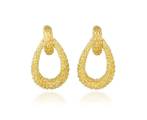 Designed as door knocker-style pendant hoops, crafted out of 18K yellow gold with a deeply textured wreath-like surface, with