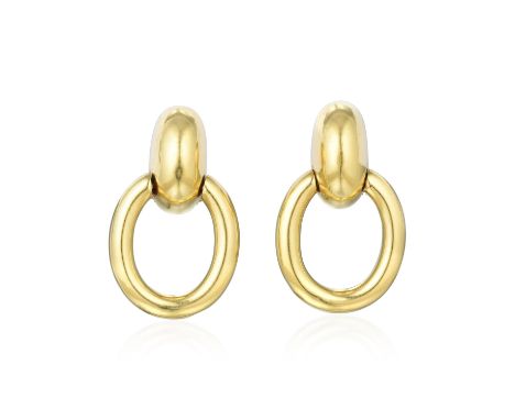 Designed as door knocker-style pendant hoops, crafted out ofÂ brightly polished 18K yellow gold with clip-on backs; measures 