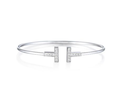 From the 'T' collection by Tiffany & Co., featuring round brilliant-cut diamonds, weighing a total of approximately 0.22 cara