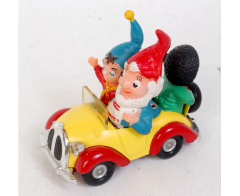 A Corgi Toys Noddy's Car comprising yellow and red body with chromed grille with Noddy and Big Ears figure in the front, and 