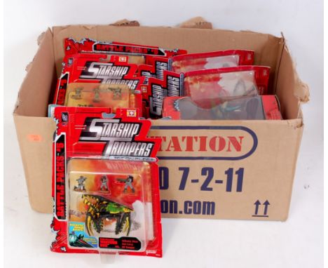 A collection of Galoob Starship Troopers action fleet, carded boxed sets to include Battle Damaged Warrier Bug, Hopper Bug an