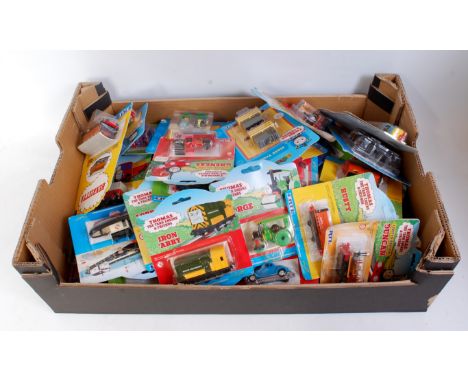 44 various carded ERTL Thomas the Tank Engine & Friends diecast locomotives and accessories to include 199 Diesel, Duncan, Ru