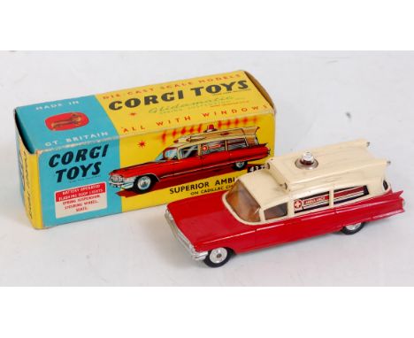 A Corgi Toys No. 437 Superior Cadillac ambulance comprising red & cream body with brown interior and spun hubs in the origina