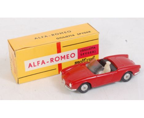 A Metosul of Portugal 1/43 scale diecast model of an Alfa Rome Giulietta Spider comprising red body with black interior and s