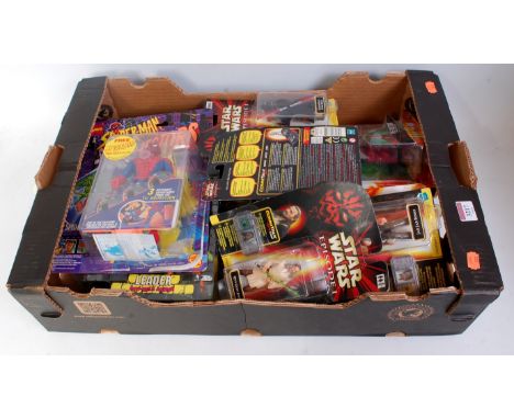 A collection of various Sci-fi and TV related carded action figures to include Star Wars Spider Man and various others exampl