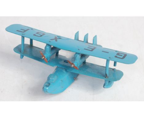 A Dinky Toys pre-war No. 60M four engined Flying Boat comprising blue diecast body with tinplate wings and G-EXGF initials to