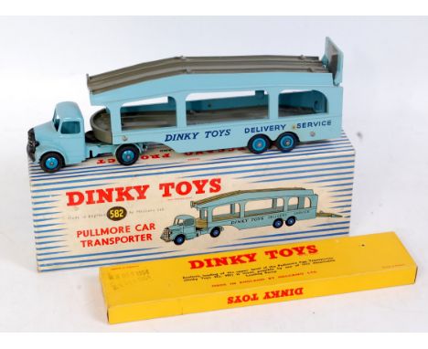 A Dinky Toys No. 582 Pullmore Car Transporter comprising light blue and grey body with mid blue hubs, sold with the original 