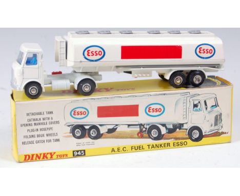 A Dinky Toys No. 945 AEC fuel tanker Esso comprising white body with blue interior and light grey catwalk with Esso livery an