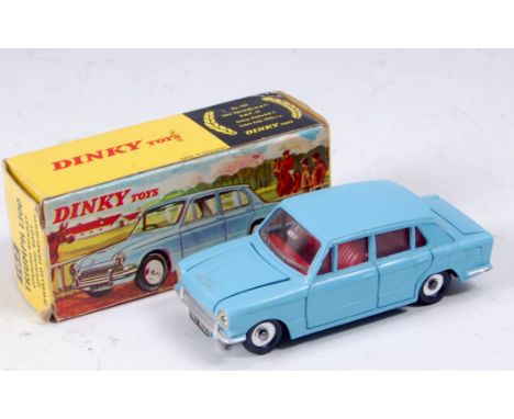A Dinky Toys No. 162 Triumph 1300 comprising light blue body with red interior and spun hubs, in the original all-card pictur