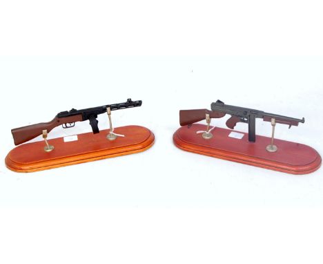 Present Arms Pewter Kit Built Models of Weapons, 2 examples raised on plinths, to include US Army WW2 Thompson "Tommy Gun", a