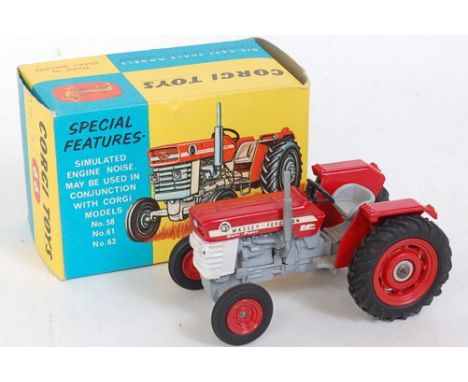 A Corgi Toys No. 66 Massey Ferguson 165 tractor, comprising red, grey & white body with red diecast hubs, in the original blu