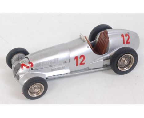 A Western Models white metal 1/24 scale model of an F1 Mercedes racing car finished in silver with racing No. 12 and brown in