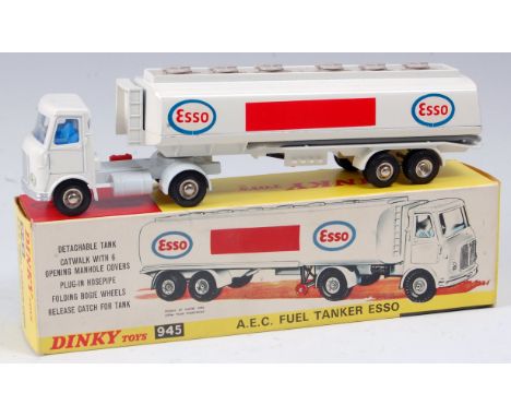 A Dinky Toys No. 945 AEC fuel tanker Esso comprising white body with blue interior and light grey catwalk with Esso livery an