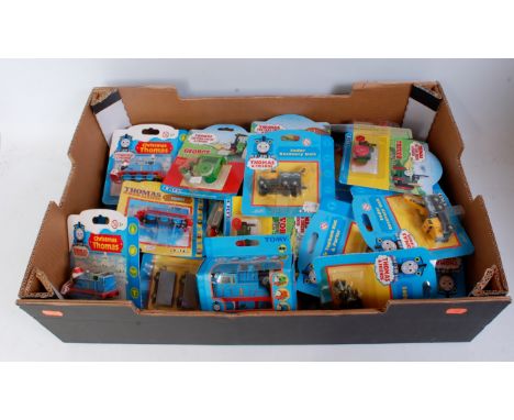 36 various ERTL Thomas the Tank Engine & Friends carded diecast locomotives and accessories to include George, Trevor, Sodor 