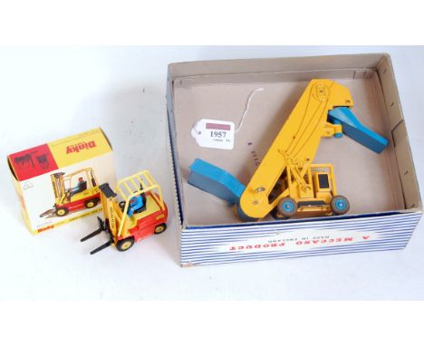 A Dinky Toys boxed diecast group to include No. 964 elevator loader comprising yellow and blue body  with blue hubs and grey 