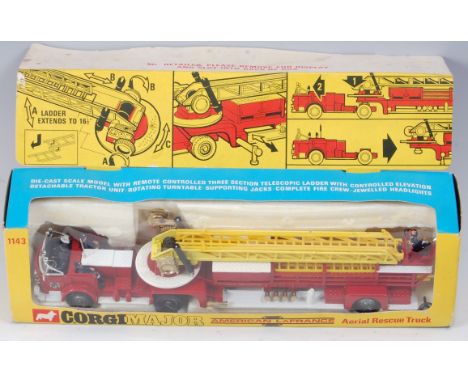 A Corgi  Toys No. 1143 American La France aerial rescue truck fire engine comprising red & white body with yellow ladder, var