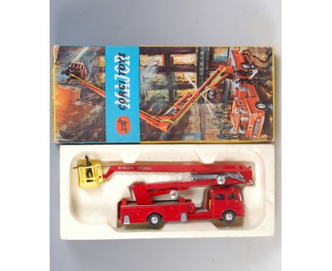 A Corgi Toys No. 1127 Simon Snorkel fire engine, comprising red and silver body with various fireman figures in the original 