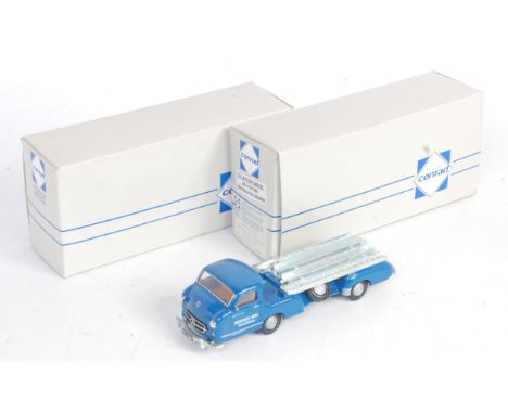Two boxed Conrad 1/50 scale No. 1034 Mercedes Benz Renn transporter finished in blue with red interior and detailed cast hubs