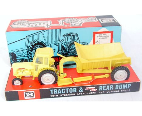 A Britains No. 9630 Fordson Supermajor tractor and rear dump, all yellow version with grey hubs, complete with original yello