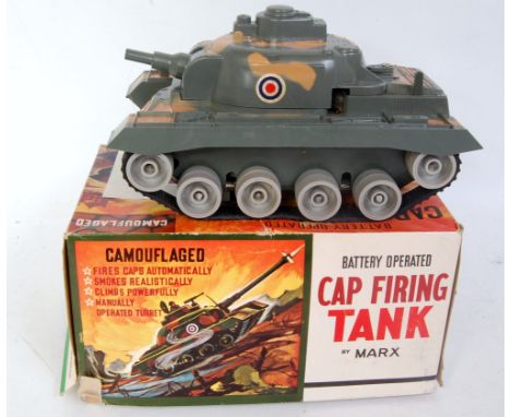 Marx plastic and Battery operated Cap Firing Tank, camouflage body, with packet of caps, in the original all card box with pa