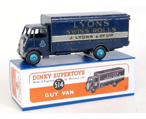 A Dinky Toys No. 514 Lyons Swiss Rolls guy van comprising dark blue body with light blue hubs, some playwear in reproduction 