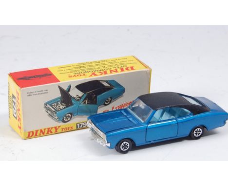 A Dinky Toys No. 179 Opel Commodore comprising metallic blue body with blue roof and light blue interior, speed wheels, in th
