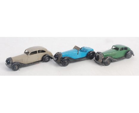 Three various loose Dinky Toys saloon diecast vehicles to include No. 36E British Salmson two-seater comprising blue body wit