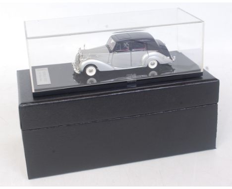 An ATC "A Top Collector" 143 scale diecast and resin model of a Rolls Royce 1951 Silver Dawn finished in silver and black in 