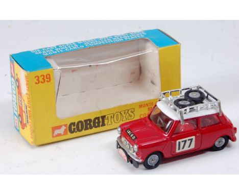 A Corgi Toys No. 339 Mini Cooper S Monte Carlo comprising red body with detailed cast hubs, white roof and two spare tyres, r