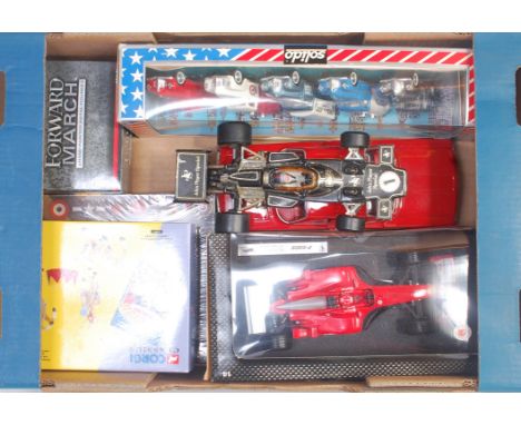 Two boxes containing a quantity of mixed modern release diecast vehicles, ceramics, and train related items to include a Hotw