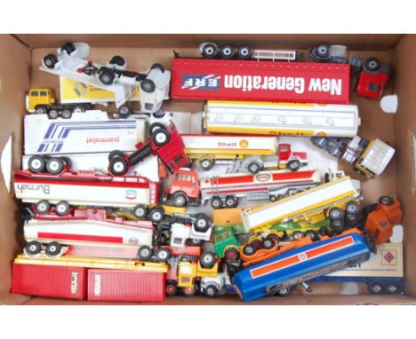 A quantity of loose vintage and modern commercial related diecast vehicles to include a Dinky Toys Burmah petrol tanker, a Co