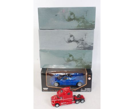 Three various boxed Minichamps and Hotwheels 1/18 scale F1 diecast to include a Minichamps IMS Event Car 2000 F1 limited edit