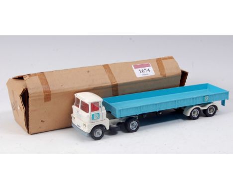 A Corgi Toys No. 1151 Scammel articulated lorry and trailer, Co-op promotional issue comprising white cab red interior with l