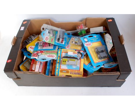 42 various carded ERTL Thomas the Tank Engine & Friends diecast locomotives and accessories to include Sodor soft side truck,