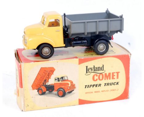A Victory Models 1/18 plastic and electric model of a Leyland Comet tipper truck comprising of yellow cab, black chassis and 
