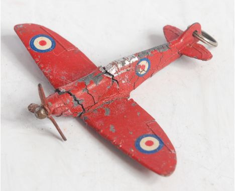 A Dinky Toys pre-war No. 62A Vickers Supermarine Spitfire (Meccano Spitfire Fund Model) finished in red with RAF roundels and