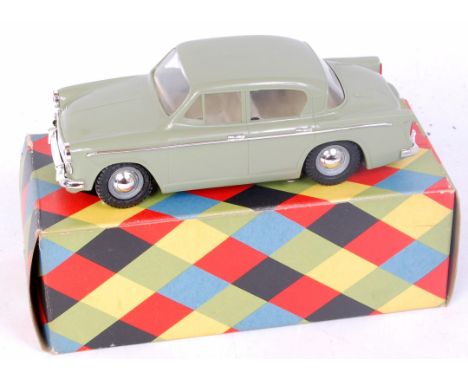 Triang 1/20th scale plastic battery operated model of a Hillman Minx, green body with cream interior, in the original box, wi