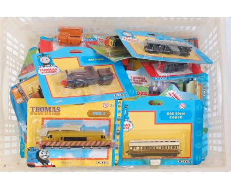 39 various carded ERTL Thomas the Tank Engine and Friends diecast locomotives and accessories to include Diesel 10, Culdee, B