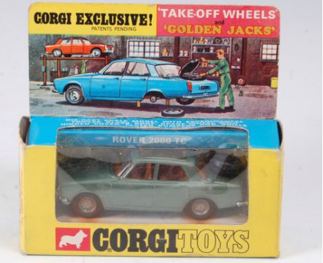 A Corgi Toys No. 275 Rover 2000 TC, comprising metallic light green body with amber glass and detailed take-off wheels, with 