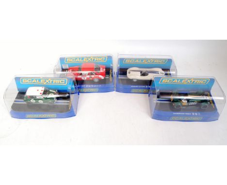 Scalextric 1/32nd scale cased Slot Car Group, 4 examples, to include C3309 Caterham R600 Jon Barnes 2013 Magnificent Sevens S