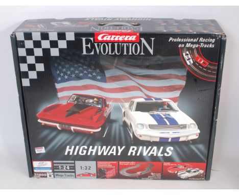 A Carrera Evolution 1/32 scale Highway Rivals slotcar racing set, appears complete, comprising Ford Mustang GT350, and Corvet