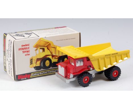 A Dinky Toys No. 924 Aveling Barford dump truck comprising red cab and silver chassis with yellow back and red hubs, in the o