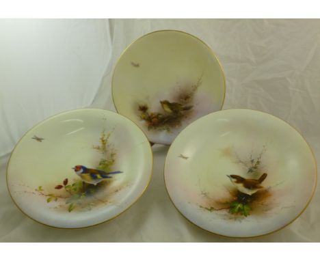 A Royal Worcester plate by James Stinton decorated with a 'Golden Crested Wren', signed Jas Stinton, titled to the underside,