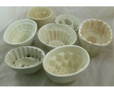 A collection of seven 19th century ceramic jelly or blancmange moulds including a Shelly example - Part of a private owner co