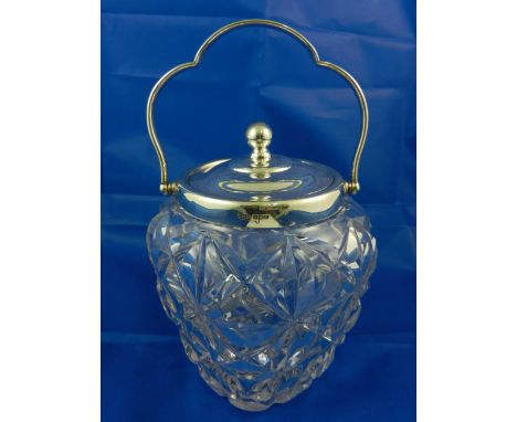 A silver mounted moulded glass biscuit barrel, with heavy gauge silver rim, handle and lid, Sheffield 1916, 17.3cm high, lid 