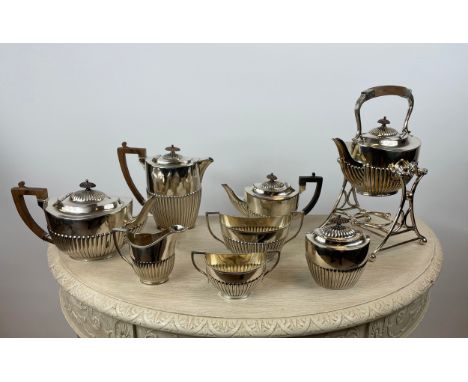 HJ LINTON, PARIS SILVER PLATED TEA AND COFFEE SERVICE, comprising three tea pots one on stand a coffee pot sugar and serving 