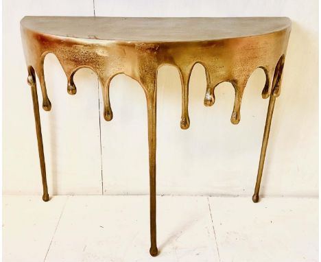 DEMILUNE CONSOLE TABLE, 76cm high, 90cm wide, 34cm deep, abstract dripping design gilt finish metal. 