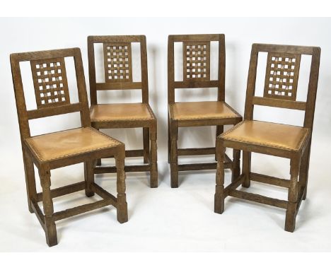 ROBERT 'MOUSEMAN' THOMPSON DINING CHAIRS, a set of four, circa 1930, oak with tan leather seats. (4) 