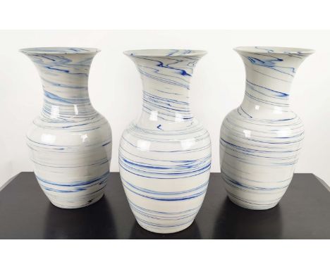 PAOLO MOSCHINO LIGHT BLUE AND WHITE SWIRL DESIGN VASES, a set of three, 41.5cm H. (3) 